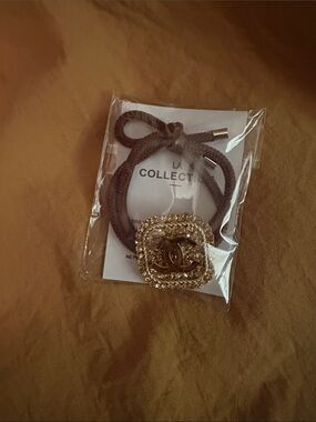 Chanel LA perfume gift Collection Brown Hair Tie with Gold Medallion